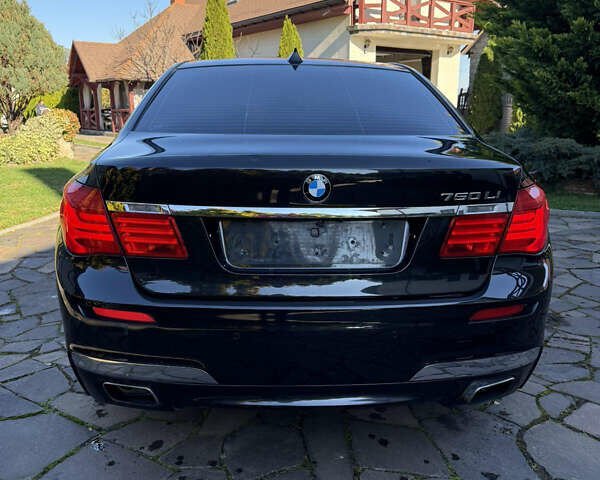 Черный БМВ 7 Серия, объемом двигателя 4.4 л и пробегом 260 тыс. км за 11900 $, фото 8 на Automoto.ua