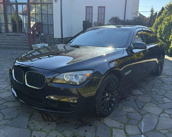 Черный БМВ 7 Серия, объемом двигателя 4.4 л и пробегом 260 тыс. км за 11900 $, фото 6 на Automoto.ua