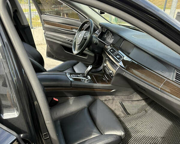 Черный БМВ 7 Серия, объемом двигателя 2.98 л и пробегом 250 тыс. км за 13500 $, фото 11 на Automoto.ua