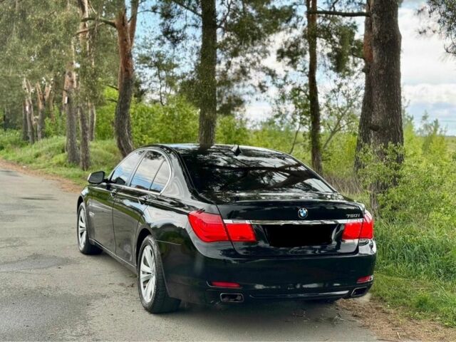 Черный БМВ 7 Серия, объемом двигателя 4.4 л и пробегом 220 тыс. км за 4300 $, фото 1 на Automoto.ua