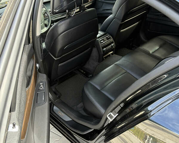 Черный БМВ 7 Серия, объемом двигателя 2.98 л и пробегом 250 тыс. км за 13500 $, фото 4 на Automoto.ua