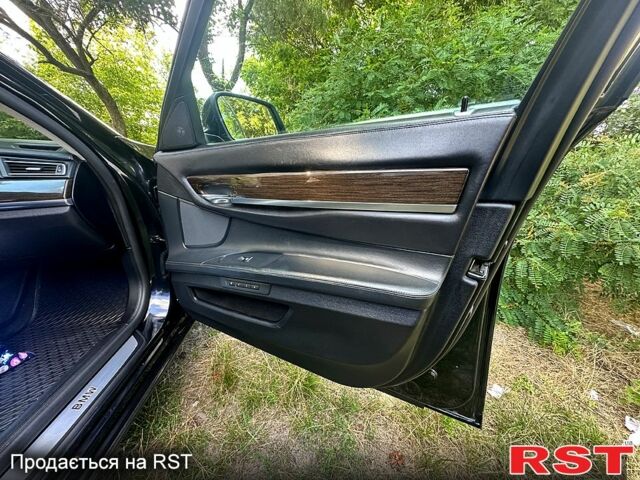 Черный БМВ 7 Серия, объемом двигателя 4.4 л и пробегом 177 тыс. км за 16500 $, фото 3 на Automoto.ua