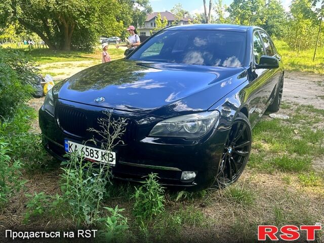 Черный БМВ 7 Серия, объемом двигателя 4.4 л и пробегом 177 тыс. км за 16500 $, фото 1 на Automoto.ua