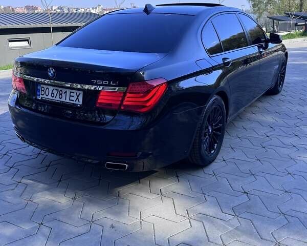 Черный БМВ 7 Серия, объемом двигателя 4.39 л и пробегом 213 тыс. км за 13700 $, фото 18 на Automoto.ua