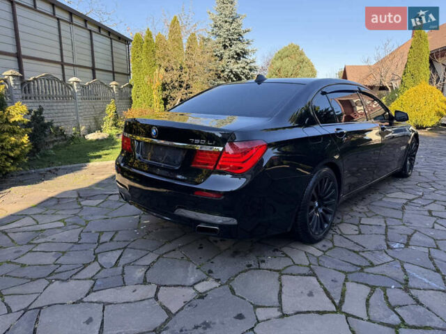 Черный БМВ 7 Серия, объемом двигателя 4.4 л и пробегом 260 тыс. км за 11900 $, фото 10 на Automoto.ua