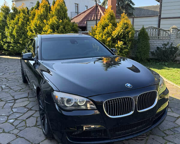 Черный БМВ 7 Серия, объемом двигателя 4.4 л и пробегом 260 тыс. км за 11900 $, фото 5 на Automoto.ua