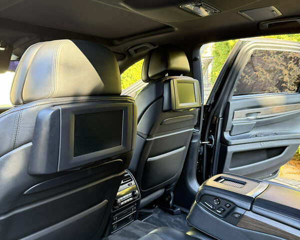 Черный БМВ 7 Серия, объемом двигателя 4.4 л и пробегом 260 тыс. км за 11900 $, фото 26 на Automoto.ua
