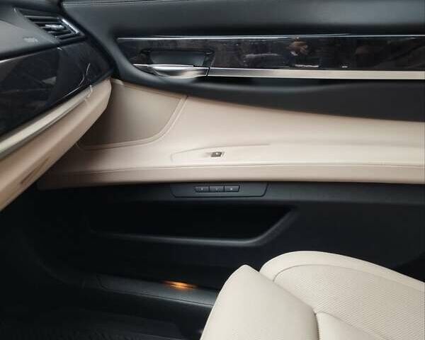 Черный БМВ 7 Серия, объемом двигателя 4.39 л и пробегом 32 тыс. км за 31990 $, фото 6 на Automoto.ua