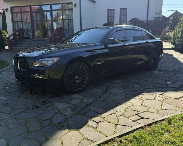 Черный БМВ 7 Серия, объемом двигателя 4.4 л и пробегом 260 тыс. км за 11900 $, фото 1 на Automoto.ua