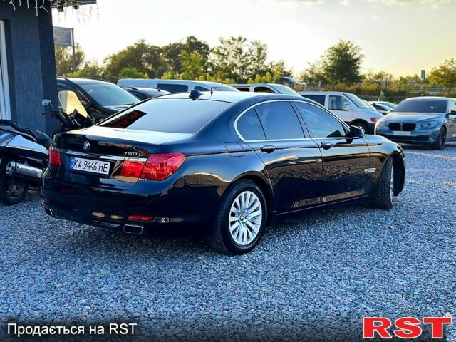 Черный БМВ 7 Серия, объемом двигателя 4.4 л и пробегом 200 тыс. км за 9999 $, фото 2 на Automoto.ua