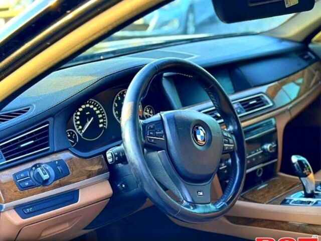 Черный БМВ 7 Серия, объемом двигателя 4.4 л и пробегом 202 тыс. км за 10500 $, фото 2 на Automoto.ua