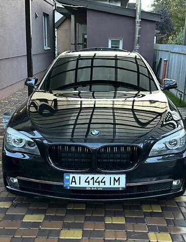 Черный БМВ 7 Серия, объемом двигателя 2.98 л и пробегом 147 тыс. км за 18000 $, фото 1 на Automoto.ua