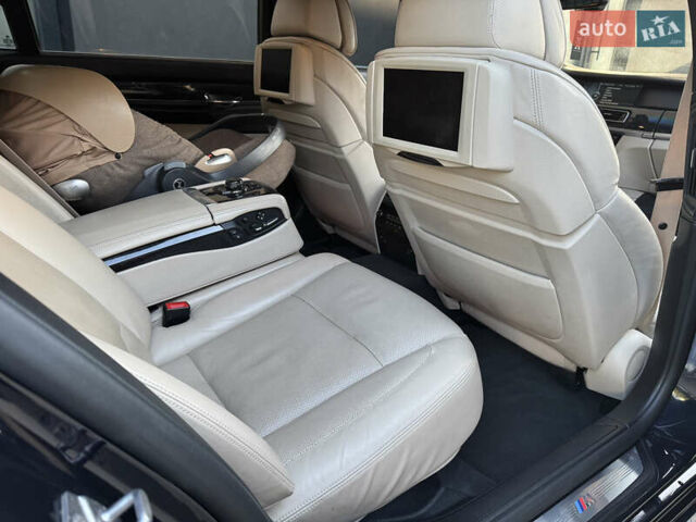 Черный БМВ 7 Серия, объемом двигателя 4.39 л и пробегом 275 тыс. км за 12800 $, фото 29 на Automoto.ua