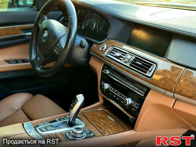 Черный БМВ 7 Серия, объемом двигателя 4.4 л и пробегом 200 тыс. км за 9999 $, фото 3 на Automoto.ua