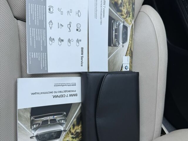 Черный БМВ 7 Серия, объемом двигателя 4.4 л и пробегом 80 тыс. км за 19333 $, фото 2 на Automoto.ua