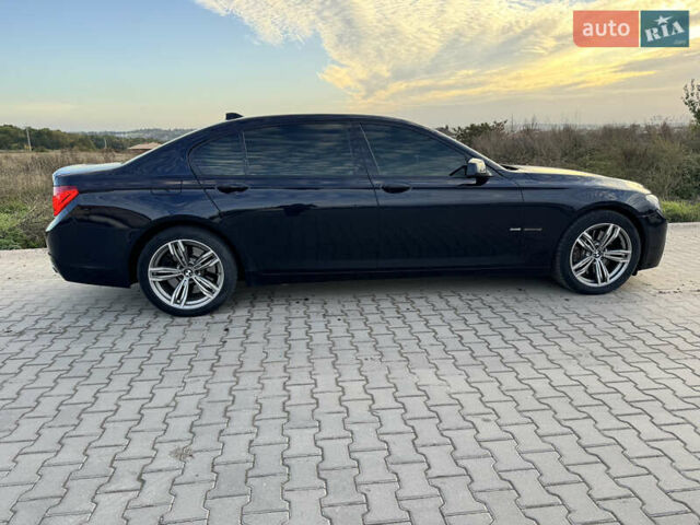 Черный БМВ 7 Серия, объемом двигателя 4.39 л и пробегом 275 тыс. км за 12800 $, фото 12 на Automoto.ua