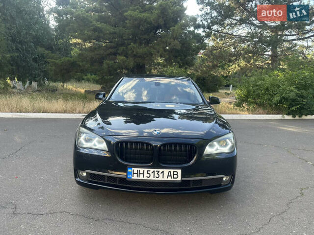 Черный БМВ 7 Серия, объемом двигателя 3 л и пробегом 302 тыс. км за 15800 $, фото 1 на Automoto.ua