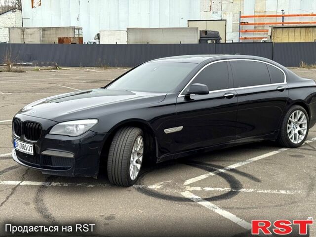 Чорний БМВ 7 Серія, об'ємом двигуна 3 л та пробігом 200 тис. км за 12400 $, фото 1 на Automoto.ua