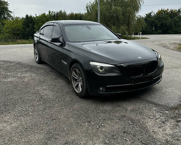 Черный БМВ 7 Серия, объемом двигателя 3 л и пробегом 260 тыс. км за 16500 $, фото 1 на Automoto.ua