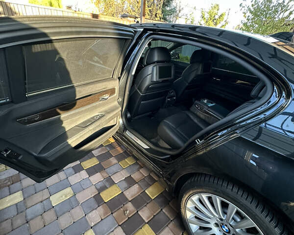 Черный БМВ 7 Серия, объемом двигателя 2.98 л и пробегом 147 тыс. км за 18000 $, фото 4 на Automoto.ua