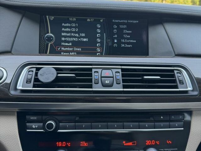 Черный БМВ 7 Серия, объемом двигателя 4.4 л и пробегом 80 тыс. км за 19333 $, фото 1 на Automoto.ua