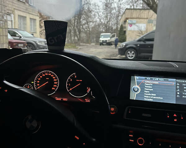 Черный БМВ 7 Серия, объемом двигателя 2.98 л и пробегом 147 тыс. км за 18000 $, фото 8 на Automoto.ua