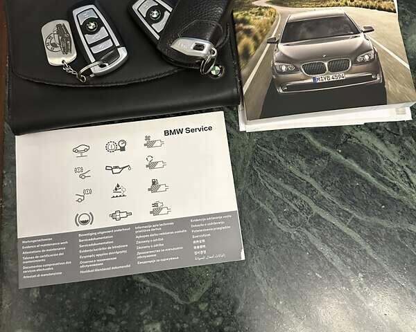 Черный БМВ 7 Серия, объемом двигателя 4.39 л и пробегом 170 тыс. км за 16800 $, фото 5 на Automoto.ua