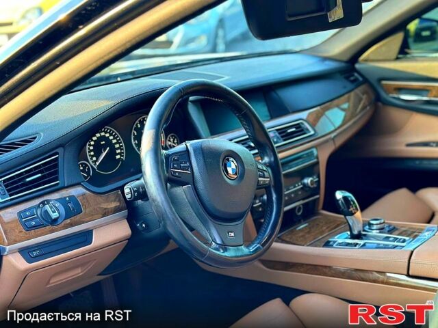 Черный БМВ 7 Серия, объемом двигателя 4.4 л и пробегом 200 тыс. км за 9999 $, фото 6 на Automoto.ua