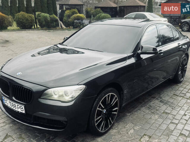 Черный БМВ 7 Серия, объемом двигателя 2.98 л и пробегом 285 тыс. км за 12500 $, фото 2 на Automoto.ua