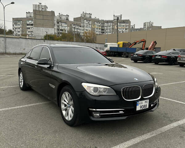 Черный БМВ 7 Серия, объемом двигателя 2.98 л и пробегом 204 тыс. км за 12300 $, фото 1 на Automoto.ua