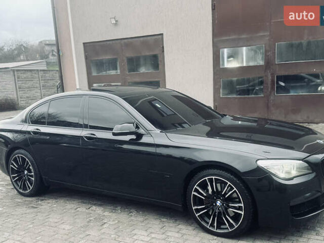Черный БМВ 7 Серия, объемом двигателя 2.98 л и пробегом 285 тыс. км за 12500 $, фото 1 на Automoto.ua