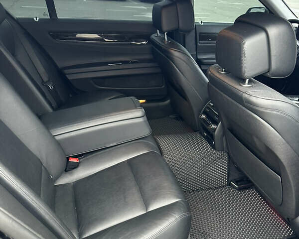 Черный БМВ 7 Серия, объемом двигателя 2.98 л и пробегом 204 тыс. км за 12300 $, фото 9 на Automoto.ua