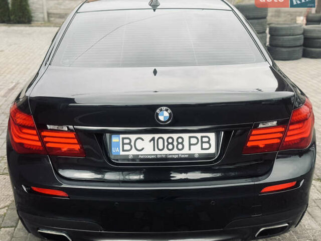 Черный БМВ 7 Серия, объемом двигателя 2.98 л и пробегом 285 тыс. км за 12500 $, фото 9 на Automoto.ua