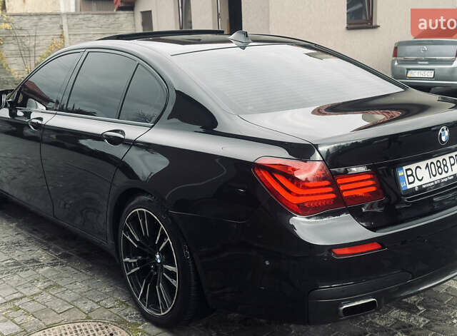 Черный БМВ 7 Серия, объемом двигателя 2.98 л и пробегом 285 тыс. км за 12500 $, фото 10 на Automoto.ua