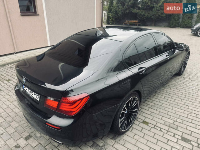 Черный БМВ 7 Серия, объемом двигателя 2.98 л и пробегом 285 тыс. км за 12500 $, фото 23 на Automoto.ua