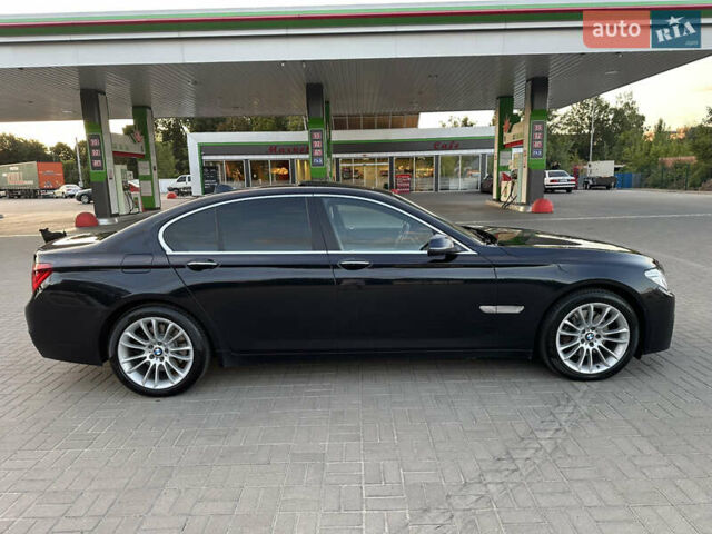 Черный БМВ 7 Серия, объемом двигателя 2.99 л и пробегом 80 тыс. км за 27900 $, фото 26 на Automoto.ua