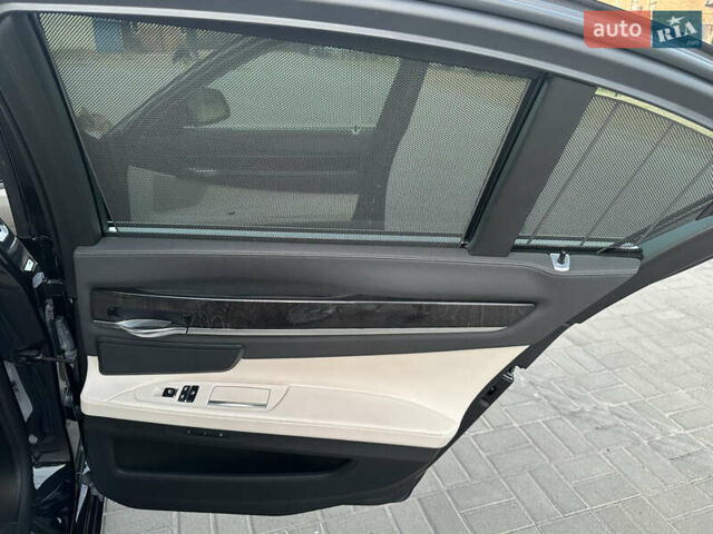 Черный БМВ 7 Серия, объемом двигателя 2.99 л и пробегом 80 тыс. км за 27900 $, фото 51 на Automoto.ua