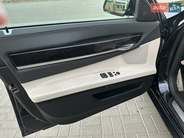 Черный БМВ 7 Серия, объемом двигателя 2.99 л и пробегом 80 тыс. км за 27900 $, фото 49 на Automoto.ua