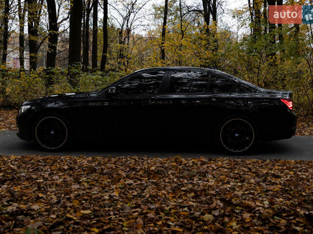 Черный БМВ 7 Серия, объемом двигателя 2.99 л и пробегом 230 тыс. км за 24900 $, фото 6 на Automoto.ua