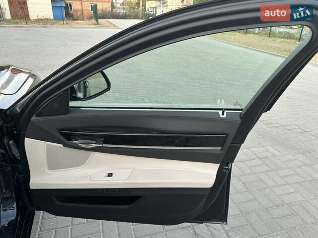 Черный БМВ 7 Серия, объемом двигателя 2.99 л и пробегом 80 тыс. км за 27900 $, фото 52 на Automoto.ua