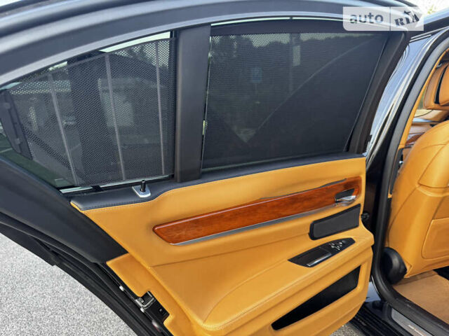 Черный БМВ 7 Серия, объемом двигателя 2.99 л и пробегом 225 тыс. км за 20000 $, фото 4 на Automoto.ua