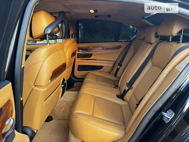 Черный БМВ 7 Серия, объемом двигателя 2.99 л и пробегом 225 тыс. км за 20000 $, фото 16 на Automoto.ua