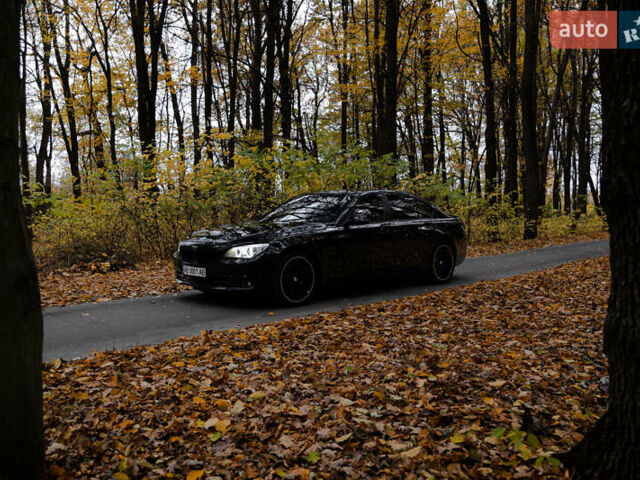 Черный БМВ 7 Серия, объемом двигателя 2.99 л и пробегом 230 тыс. км за 24900 $, фото 14 на Automoto.ua