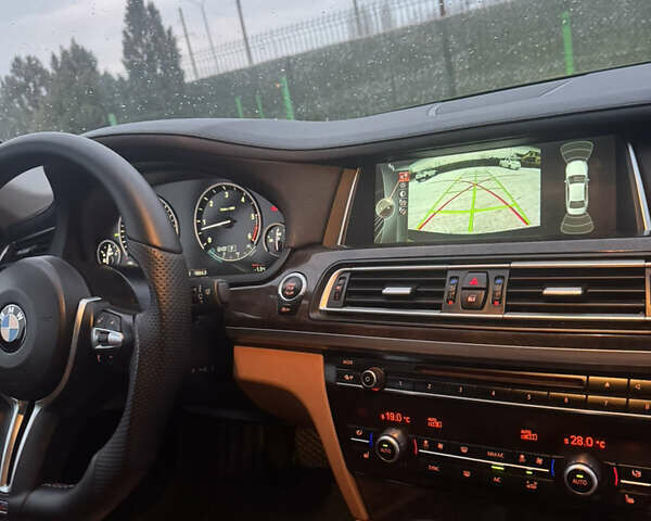 Черный БМВ 7 Серия, объемом двигателя 2.99 л и пробегом 270 тыс. км за 17999 $, фото 22 на Automoto.ua