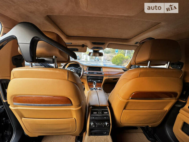 Черный БМВ 7 Серия, объемом двигателя 2.99 л и пробегом 225 тыс. км за 20000 $, фото 9 на Automoto.ua