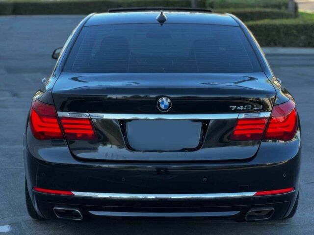 Черный БМВ 7 Серия, объемом двигателя 3 л и пробегом 83 тыс. км за 4300 $, фото 4 на Automoto.ua