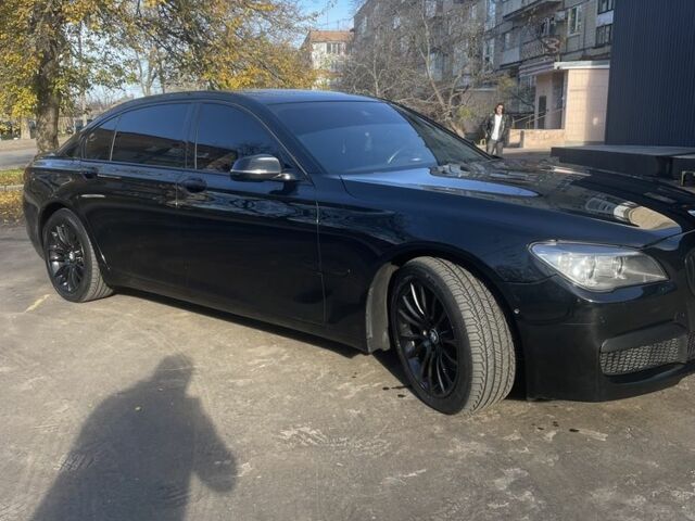 Чорний БМВ 7 Серія, об'ємом двигуна 3 л та пробігом 130 тис. км за 18500 $, фото 1 на Automoto.ua
