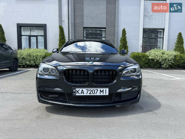 Черный БМВ 7 Серия, объемом двигателя 2.98 л и пробегом 281 тыс. км за 17777 $, фото 1 на Automoto.ua