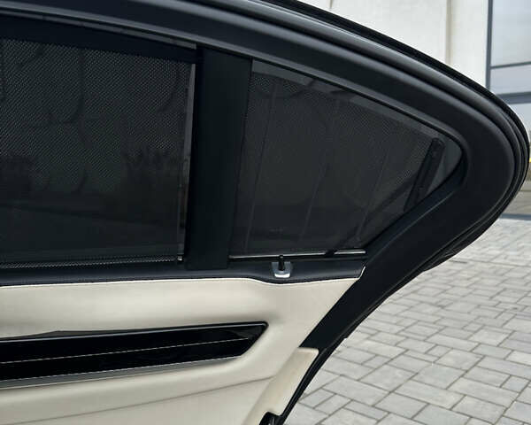 Черный БМВ 7 Серия, объемом двигателя 2.99 л и пробегом 275 тыс. км за 23500 $, фото 45 на Automoto.ua