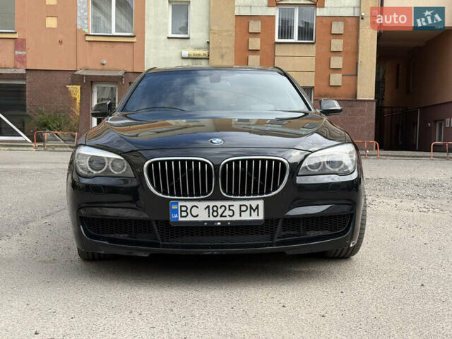 Черный БМВ 7 Серия, объемом двигателя 3 л и пробегом 210 тыс. км за 13500 $, фото 1 на Automoto.ua